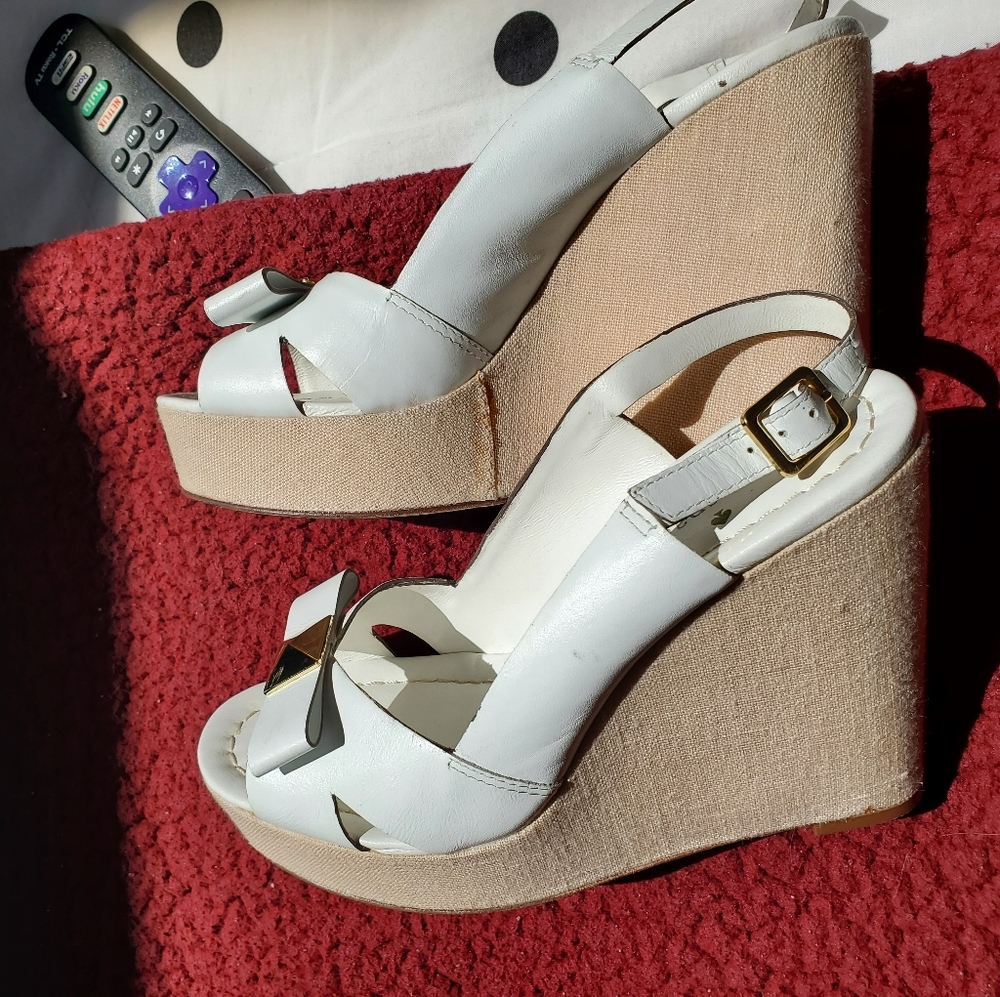 Kate Spade size 8 white and gold wedge sandal.